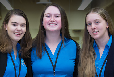 Three teen ushers