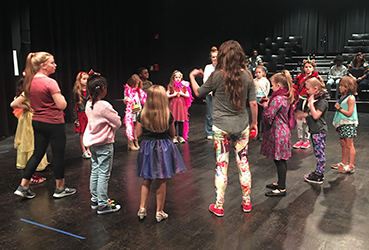 Discovery Class participants gathered in a circle.